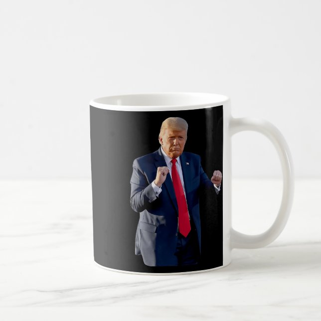 Lustigt trumfknapp som dansar som en felonröstspum kaffemugg (Höger)
