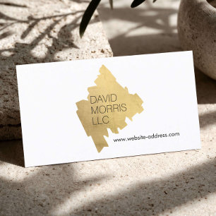 Luxe abstrakt logotyp med guld penseldrag på vit b visitkort