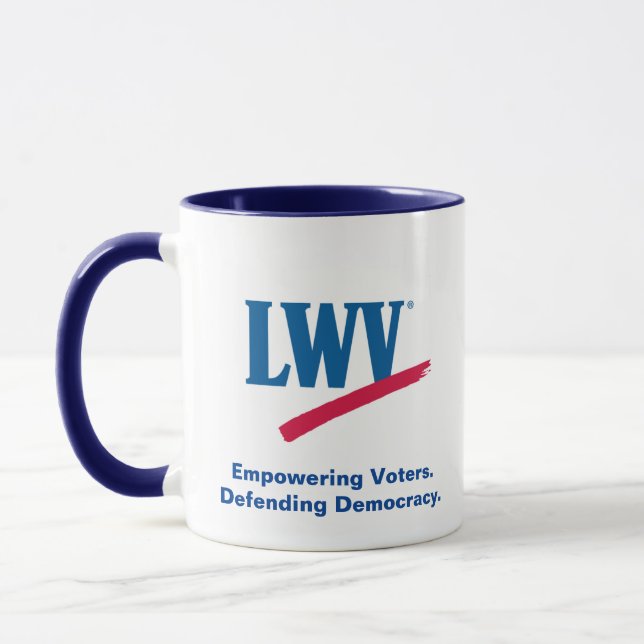 LWV Mugg med blå dekorfärg. (Vänster)