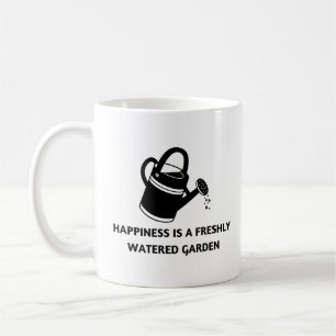 Lycka är en sötvattnad trädgård    kaffemugg
