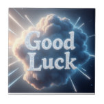 Lycka till - Glowing Cloud Typography with Light B Kakelplatta<br><div class="desc">Skicka omedelbar positivitet med den här feta "Lycka till"-designen: stort serif brev med en mjuk gnistra struktur flyter över ett dramatiskt glödande moln, strålar ut ljus som skapar djup och energi från firande. Den blå paletten och det negativa utrymmet i coolan gör att meddelandet visas från vilken vinkel som helst....</div>