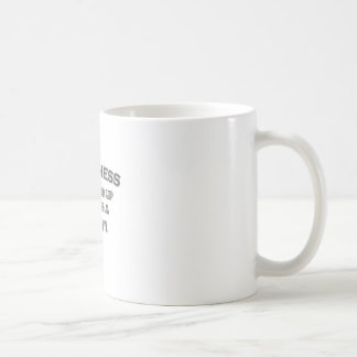 Lyckan vaknar bredvid en kiwi kaffemugg