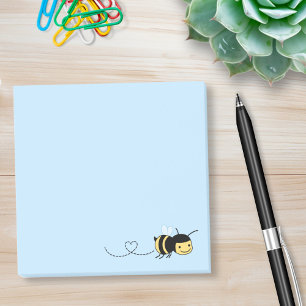 Lycklig Bee Buzzing runt blått Post-it Block