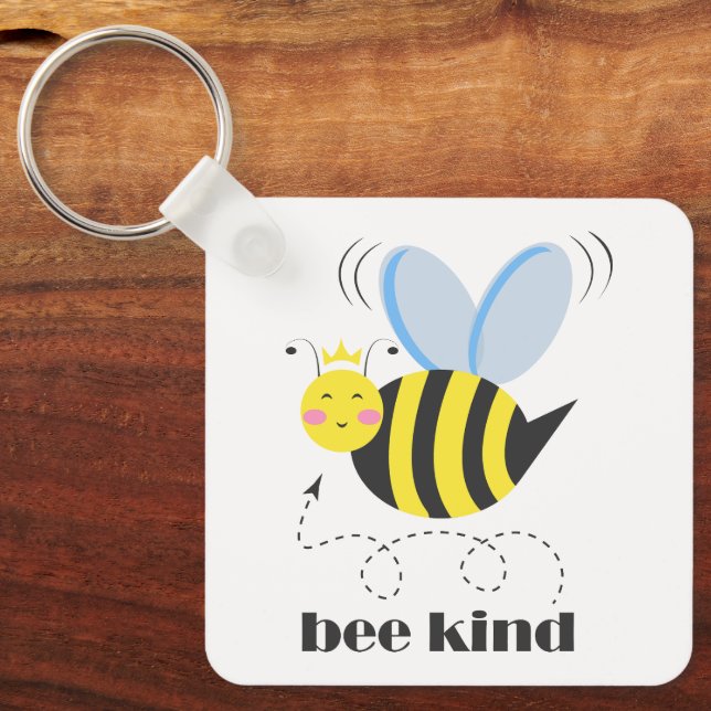 Lycklig bee prinsessan med krona och slogan Bee Ki Nyckelring (Framsida)