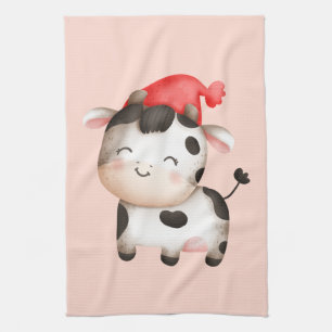 Lycklig Cow i en Cute Red Hat Kökshandduk