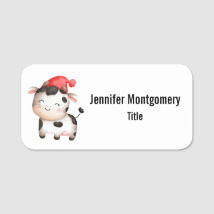 Lycklig Cow i en Cute Red Hat Namnbricka