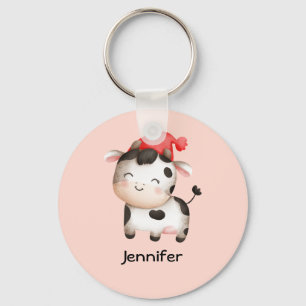 Lycklig Cow i en Cute Red Hat Nyckelring