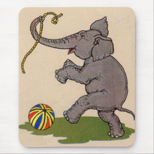 lycklig elefant leker med rep och boll musmatta
