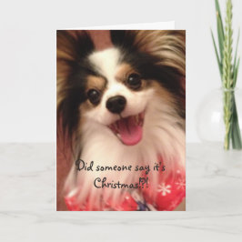 Lycklig jul som ler det Papillon kortet Helgkort