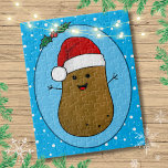Lycklig julpotatis pussel<br><div class="desc">Lustigt söt lycklig brun tecknad-potatis med röd och vit julhatt. Potatisen ligger i en tecknad konst stil och färgad brun, han har hållit arm och finger och ett stort lycklig leende med punkter för ögon. Tomten på huvudet är röd med en vit trim och en vit pompom hängande. Han befinner...</div>