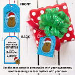 Lycklig-julpotatisen, Personlig Presentetikett<br><div class="desc">Lustigt söt lycklig brun tecknad-potatis med röd och vit julhatt. Potatisen ligger i en tecknad konst stil och färgad brun, han har hållit arm och finger och ett stort lycklig leende med punkter för ögon. Tomten på huvudet är röd med en vit trim och en vit pompom hängande. Han befinner...</div>