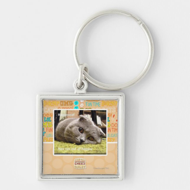 Lycklig katt, ut ur lycklig fyrkantig silverfärgad nyckelring (Framsidan)