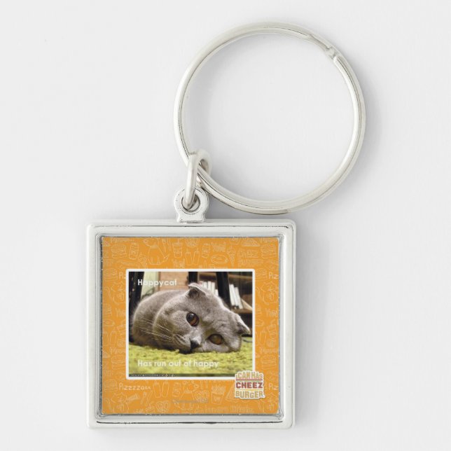 Lycklig katt, ut ur lycklig fyrkantig silverfärgad nyckelring (Framsidan)