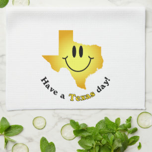 Lyckligt ansikte - ha en Texas dag! Kökshandduk