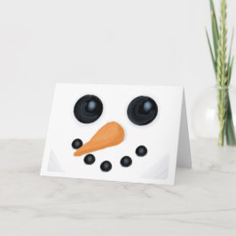 Lyckligt snögubbeansiktekort helgkort