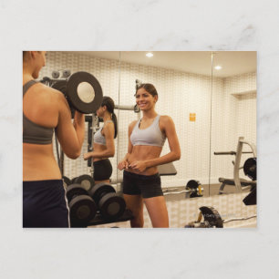 Lyftvikter i gym vykort