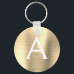 Lyxig guld falsk rostfritt stål monogram nyckelring<br><div class="desc">Lyxig guld falsk rostfritt stål metallisk elegant nyckelring. Dessa nyckelringar kan anpassas för att inkludera din initial och förnamn. Dessa nyckelringar är perfekta som födelsedagspresent,  bröllop eller möhippa-favoriter.</div>