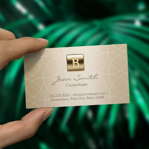 Lyxig guld- MonogramCosmetologist Visitkort