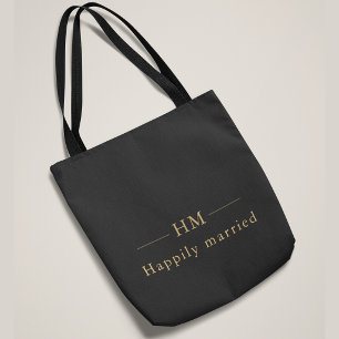 Lyxig personlig vigselgåva i guld med monogram tygkasse