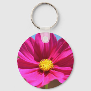 Magenta blomma nyckelring