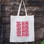 Magenta Boho Trendig Boho Retro Personlig Bride Tygkasse<br><div class="desc">Är du tittar för perfekten på ditt kommande bachelorettparti? Se inte längre än vår personlig tote bags! Varje väska är tillverkad med högkvalitativa material och har en unik utformning av trendiget som passar perfekt till stil. Dessutom är varje väska personlig med din egen unika text och namn skapar den perfekten...</div>