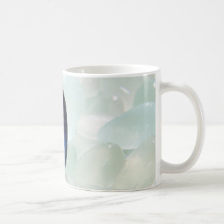 Magi av havsexponeringsglas kaffemugg