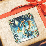 Magic Dragon jul with Holly Fyrkantigt Klistermärke<br><div class="desc">Den här AI-teckningen har ett julkort med en magisk drake på ett snö-täckt backe,  omgivet av grå och ömtålig snöflingor som lyssnar i vinterljuset. Dronens skalor kryper i isigens blues och festliga gröntar,  och blandas perfekt med helgdag-scenen,  medan ögon har en varm,  klok glöd att inbjudan är en  värld.</div>