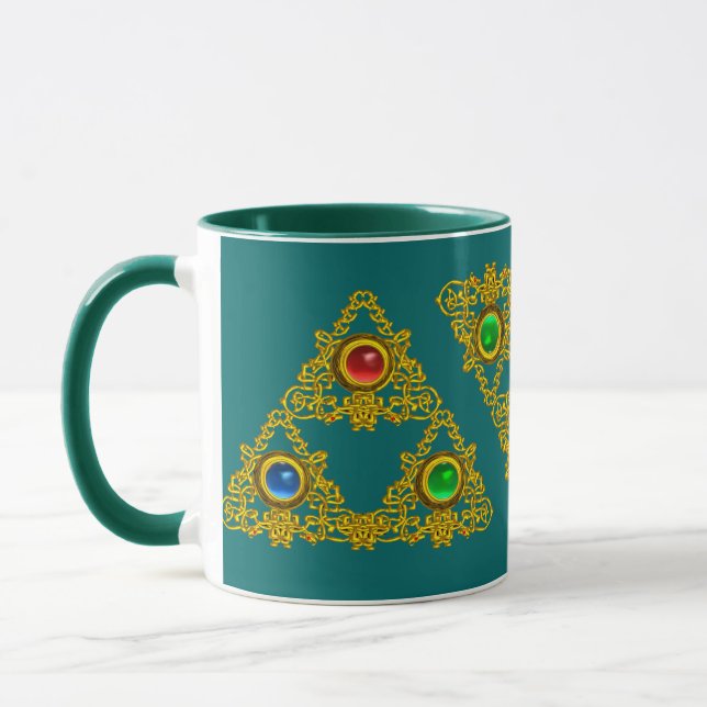 MAGIC ELFIC TALISMAN /GULD TRIANGLE MED GEMSTONER MUGG (Vänster)