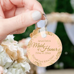 Maid of honor Bröllop Gift Guld Frills Coral Peach Nyckelring<br><div class="desc">Dessa nyckelkedjor är designade för ge som Maid of honor i er bröllopsfest. De har en enkel utformning av eleganten med blek, persikor eller färgad av lätt orange, guld-text och en lacy golden faux foil blommigt gräns. Texten lyder "Maid of honor" med plats för hennes namn, parets namn och bröllop-datumet....</div>