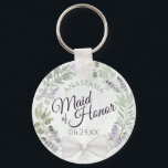 Maid of honor Eucalyptus Lavender Wandan Bröllop Nyckelring<br><div class="desc">Dessa nyckelkedjor är designade för ge som en tjänst eller gåva till Maid of honor i er bröllopsfest. De har en strålande, handmålad vattenfärgskonstruktion med en krans av eukalyptus löv, lavenderblommor och löv i sage grönt och lätt lila. Texten är skriven i elegant brev, och det finns utrymme för hennes...</div>