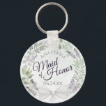 Maid of honor Eucalyptus Lavender Wandan Bröllop Nyckelring<br><div class="desc">Dessa nyckelkedjor är designade för ge som en tjänst eller gåva till Maid of honor i er bröllopsfest. De har en strålande, handmålad vattenfärgskonstruktion med en krans av eukalyptus löv, lavenderblommor och löv i sage grönt och lätt lila. Texten är skriven i elegant brev, och det finns utrymme för hennes...</div>