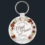 Maid of honor Rustic Fall Blommigt Utandning Bröll Nyckelring<br><div class="desc">Dessa nyckelkedjor är designade för ge som en tjänst eller gåva till Maid of honor i er bröllopsfest. De har en rustik handmålad vattenfärgskonstruktion med en krans av ro och löv i skuggor av bränt antal, rost orange och korallpersika. Texten är skriven i elegant brev, och det finns utrymme för...</div>