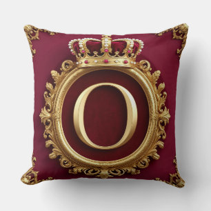 Majestätig gul monogram med krona på kunglig samme kudde