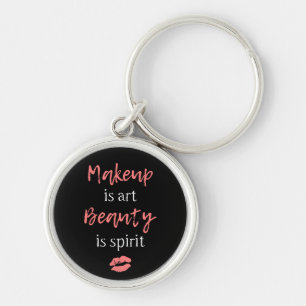 Makeup är konstskönhet är anden rund silverfärgad nyckelring