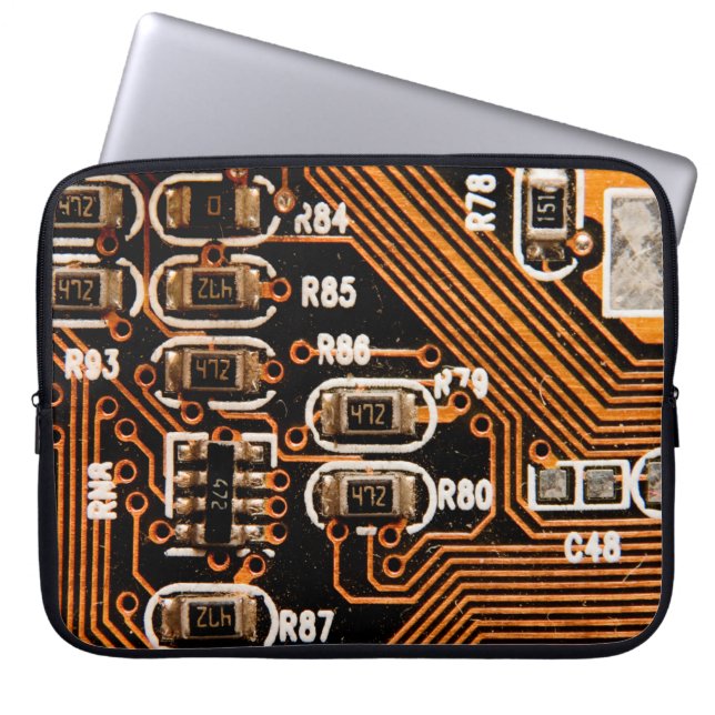 makroskott av kretskort, kablar, kondensatorer, ko laptop fodral (Framsidan)