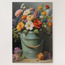 Målad sommarblombukett i en grön hink