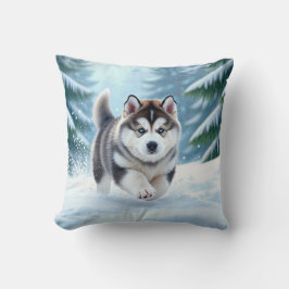 Malamute-valp i snön kudde
