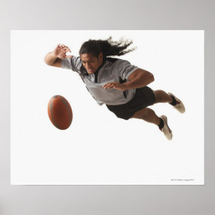 Male rugbyspelaredykning för boll poster
