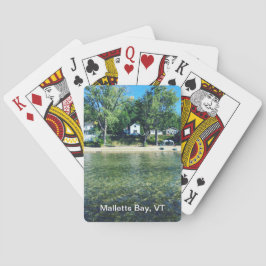 Malletts fjärd som leker kort spelkort