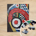 Målningsnr 46 | Marsden Hartley Pussel<br><div class="desc">Målningsnr 46 (1914-1915) av Marsden Hartley är en abstrakt som visar konstnärens utforskning av moderism och färg-teori. Sammansättningen har fet, mättad primär färg - svart, vit, röd, blå, gult och grönt - i dynamiska och uttrycksfulla former. Hartleys använda av färg förmedlar känslor och rörelse, karakteristiskt för hans moderata stil. I...</div>