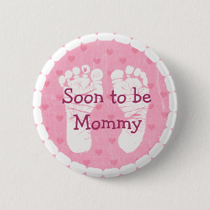 Mammor som är den rosa fotspårbaby shower, knäp knapp