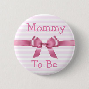 Mammor som är den rosa & vitbaby shower, knäppas knapp
