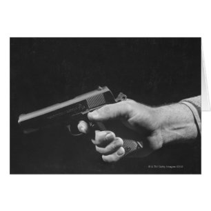Man Holding Gun Hälsningskort