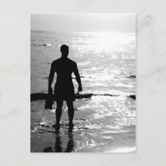 Man i soluppgången vykort