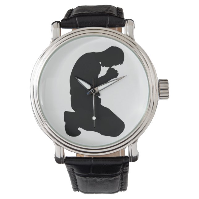 MAN KNEELING IN PRAYER ARMBANDSUR (Framsida)