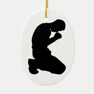 MAN KNEELING IN PRAYER JULGRANSPRYDNAD KERAMIK