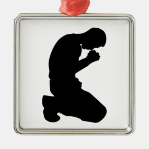 MAN KNEELING IN PRAYER JULGRANSPRYDNAD METALL
