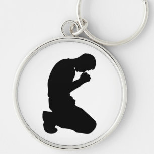 MAN KNEELING IN PRAYER RUND SILVERFÄRGAD NYCKELRING