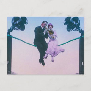 Man och kvinna sitter på telefontråd 1900 vykort