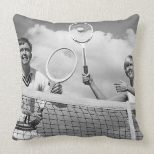Man och kvinna som leker tennis kudde